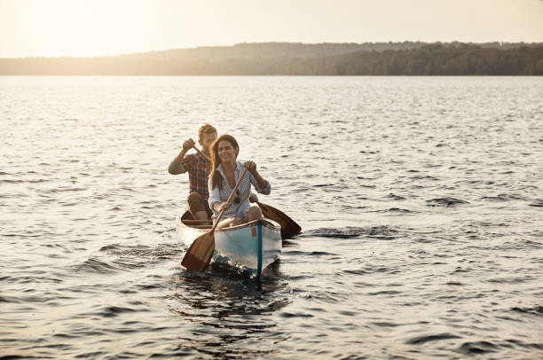 istock Rowing our boat gently on the lake 918568704