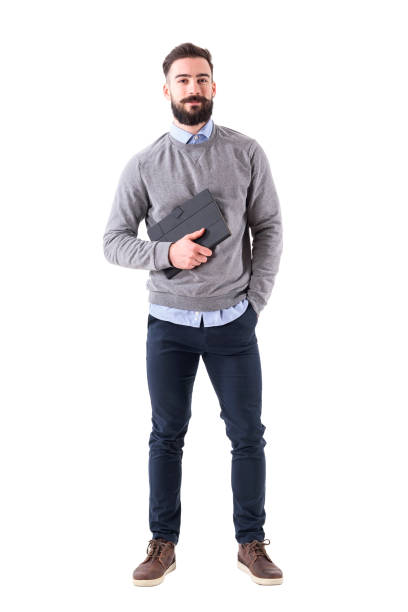 istock Smiling happy bearded businessman holding planner looking at camera 918569482