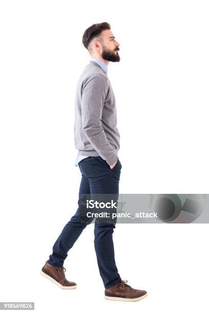 Confident Successful Smart Casual Businessman Walking With Hands In Pockets Stock Photo - Download Image Now