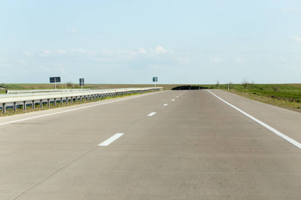 istock new asphalt road on nature 918573022