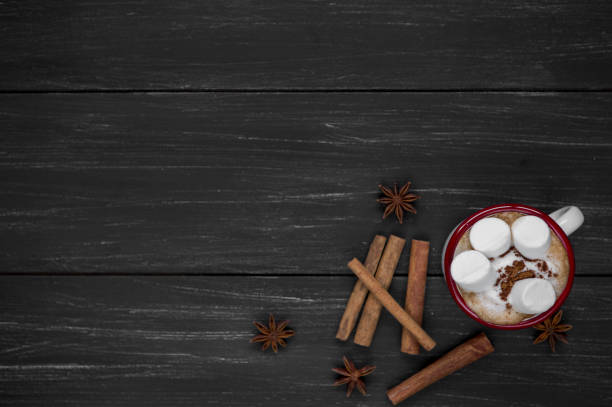 istock Marshmallow in a cup of cocoa on a wooden background 918573202