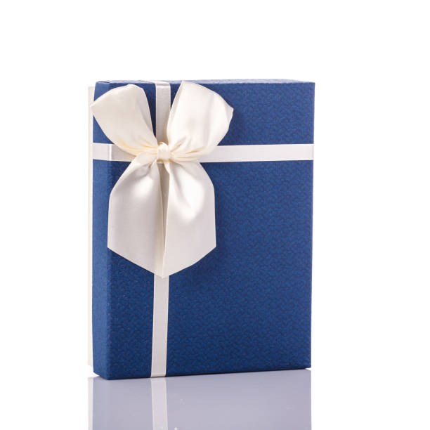istock New color gift box with ribbon. Studio shot isolated on white 918573510