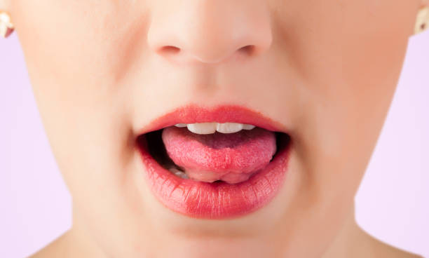 istock Beautiful woman red lips close up 918573558