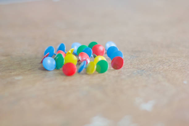 istock colorful pin on wooden 918575720