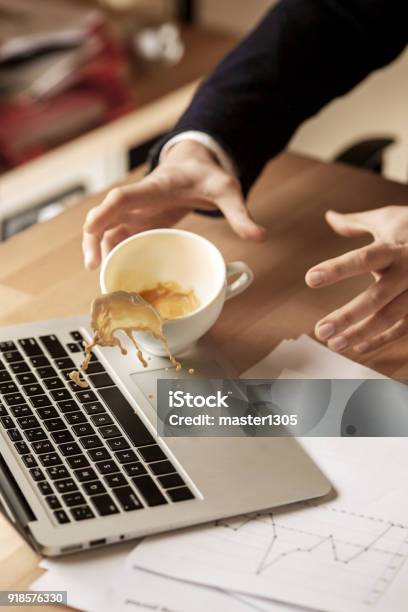 Coffee In White Cup Spilling On The Table In The Morning Working Day At Office Table Stock Photo - Download Image Now