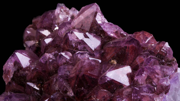 istock Amethyst quartz mineral on black background 918580070