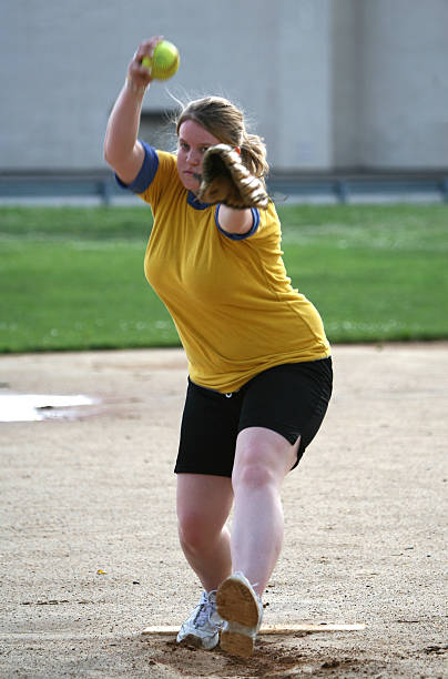 windmill pitcher  softball pitcher stock pictures, royalty-free photos & images