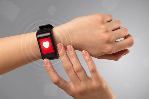 istock Hand with smartwach and helath concept 918582912