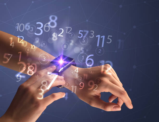 istock Close up hand with smartwatch and numbers 918583738