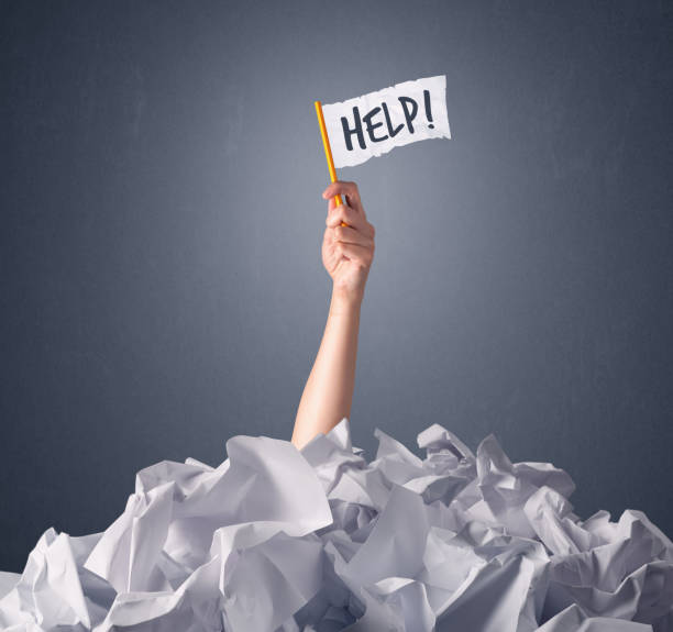 istock Female hand holding help sign 918586840