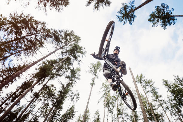Mountain Biking Man Gets Big Air off Jump