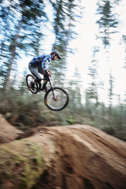 istock Mountain Biking Man Gets Big Air off Jump 918586982