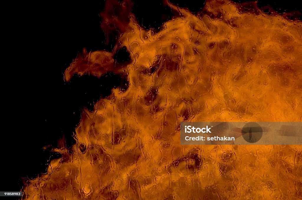 Fuoco attraverso una finestra e devil - Foto stock royalty-free di Diavolo