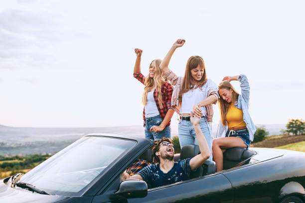 istock Teenagers riding in the car. 918590920
