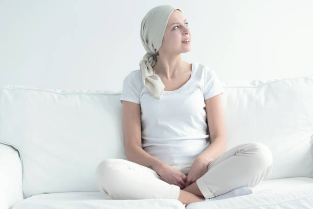 istock Smiling sick woman with headscarf 918599852