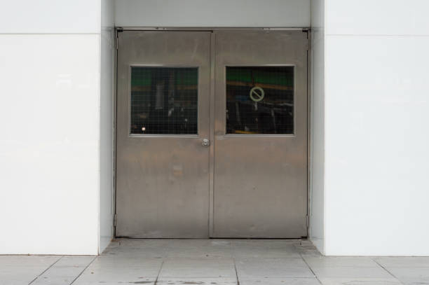 istock sidewalk by street wall & door 918600440