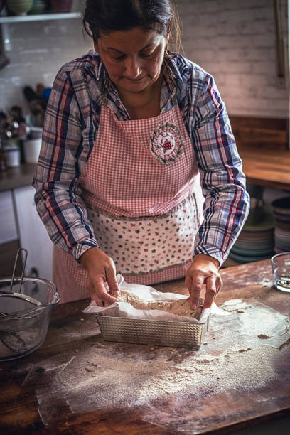 istock Kneading Loaf of Bread with Hands 918609580