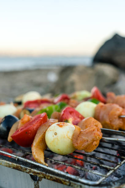 Lime Chicken Skewers on Grill at Beach