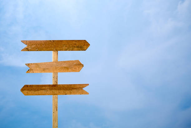 istock Empty wooden sign isolated blue sky background. 918612992