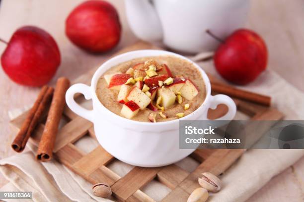 Porridge With Apples And Cinnamon Stock Photo - Download Image Now - Cinnamon, Porridge, Apple - Fruit