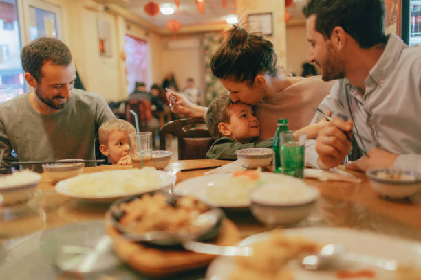 istock Family and friends dinner time 918618602