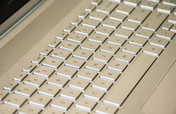 istock Silver keyboard on perfect silver laptop 918621574