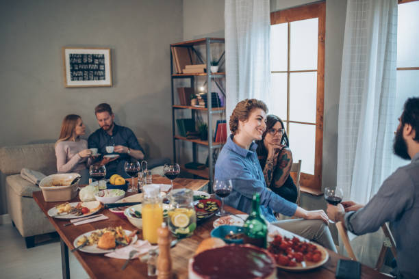 istock Group of friends relaxing after having lunch 918622032