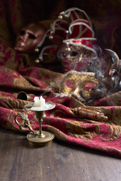 istock Candlestick and carnival masks . 918625214