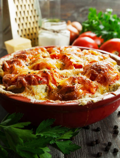 istock Fish baked with tomatoes, sour cream and cheese 918625860