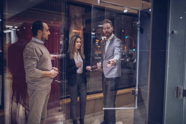 istock Young couple buying shower in store 918632696