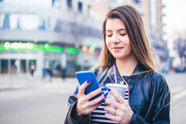 istock Young woman looking at mobile phone. 918634102