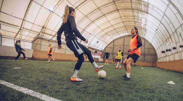 istock Female Soccer Players On A Playing Field 918634766