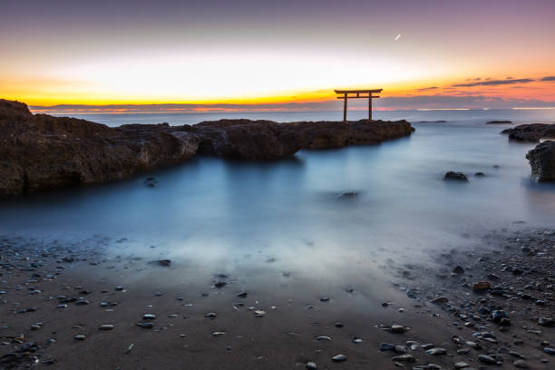 Oarai Isosaki-jinja Shrine Toroii Ibaraki Japan Ibaraki, Japan - February 4, 2017: Torii in The Sea at Oarai Isosaki-jinja Shrine. This historic shrine established in 856 enshrines a deity of medicine who bestows happiness and good match. ibaraki prefecture stock pictures, royalty-free photos & images