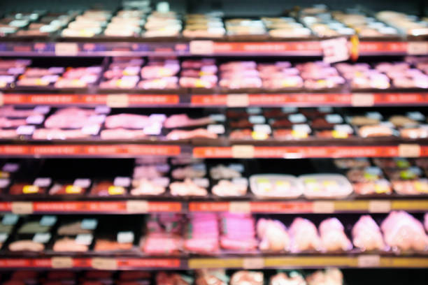 istock Abstract supermarket grocery store blurred defocused background with bokeh light 918649492