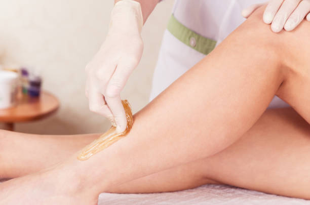 istock Cosmetic epilation on the lower leg close-up 918653452