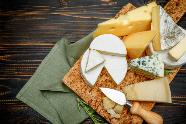 istock Various types of cheese - parmesan, brie, roquefort, cheddar 918656860