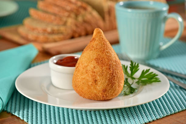 Coxinha Typical Brazilian snack with black coffee coxinha stock pictures, royalty-free photos & images