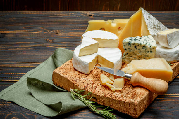 istock Various types of cheese - parmesan, brie, roquefort, cheddar 918656966