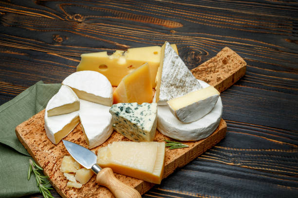 istock Various types of cheese - parmesan, brie, roquefort, cheddar 918657042