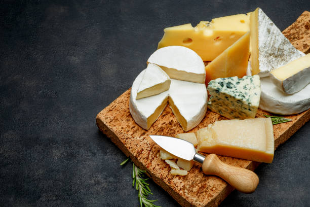 istock Various types of cheese - parmesan, brie, roquefort, cheddar 918657096