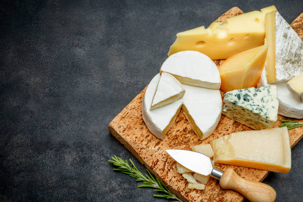 istock Various types of cheese - parmesan, brie, roquefort, cheddar 918659078