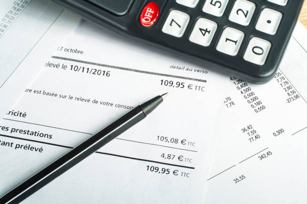 istock Finance and budget concept. Calculator, pen and accounting document on office table 918659426