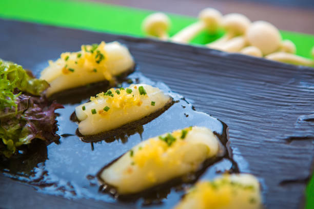 istock Pieces of white tuna with herbs and sauce 918667666