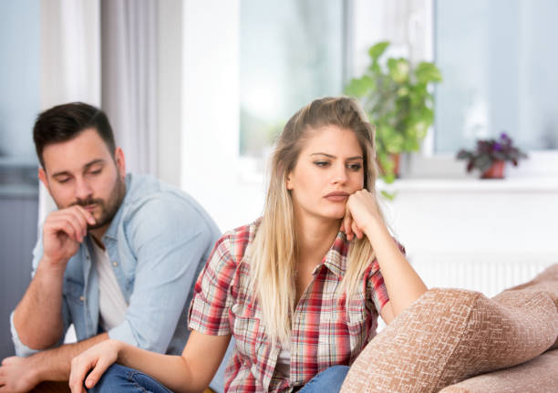 istock Young couple having fight at home 918674970