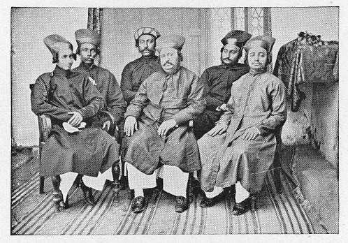 Group of Parsi men in Bombay, India during the british era. Vintage halftone circa late 19th century. Bombay is now modern day Mumbai.