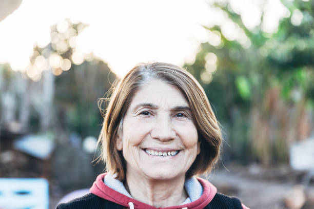 istock Happy senior woman smiling 918678602