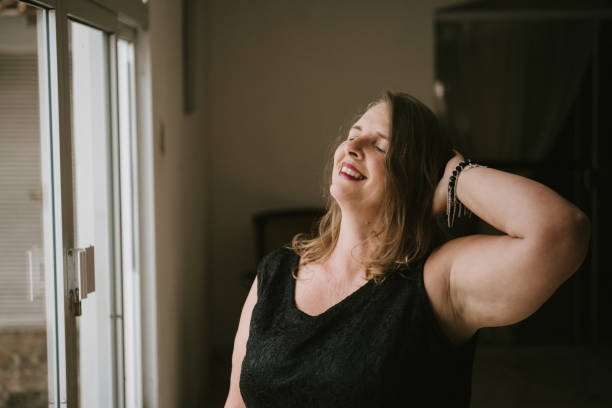 istock Positive woman at home 918678674