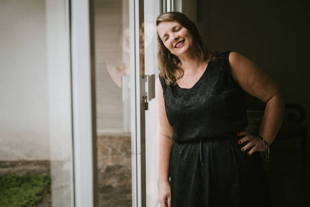 istock Positive woman at home 918678684