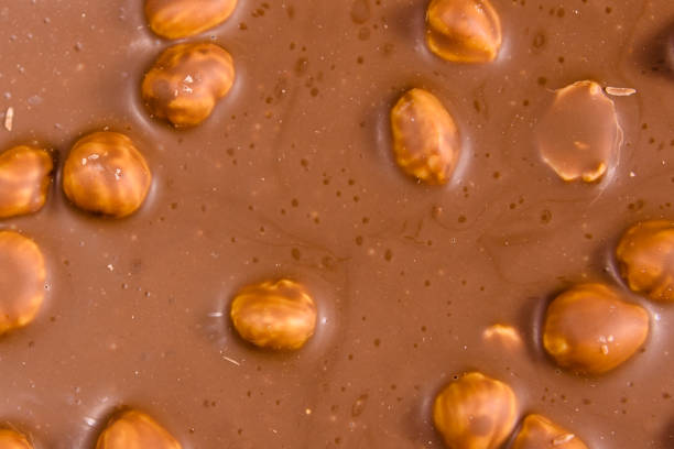istock Background of the dark chocolate with a hazelnuts 918681188