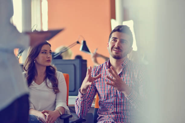 istock Group Young Coworkers Making Great Business Decisions.Creative Team Discussion Corporate Work Concept Modern Office. 918695214